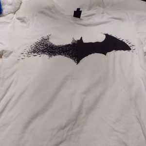 A white tshirt with batman logo